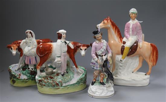 Four mid 19th century Staffordshire pottery groups and figures tallest 23cm